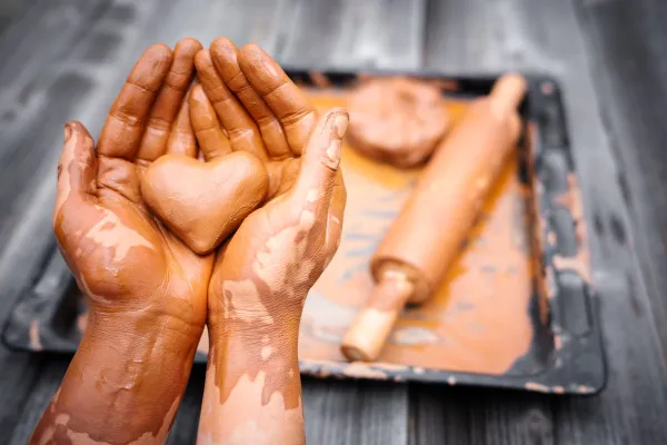 heart-made-of-potter-39-s-clay-in-the-hands-of-a-2026-01-08-05-35-04-utc-697b5154b6248